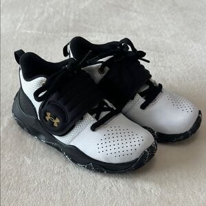 Under Armour White and Black Sneakers with Gold Accents